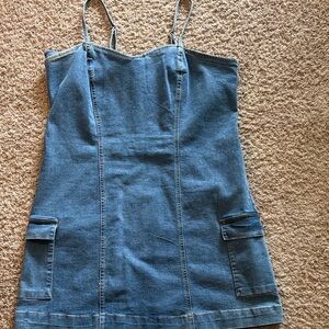 Celebrity Pink Denim Mini Dress with Pocket Details
